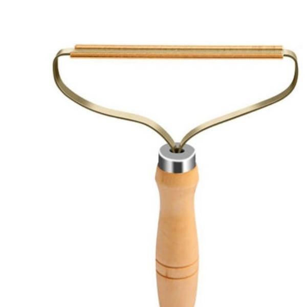 Шабер волос кота одежд шабера корпии ковра ткани пушка шерстяной