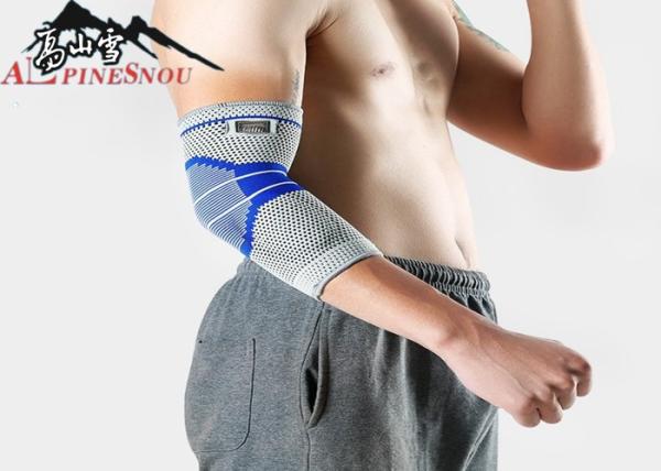 Tissu tricoté par protecteur antidérapant S M L taille de coude de sports de silicagel