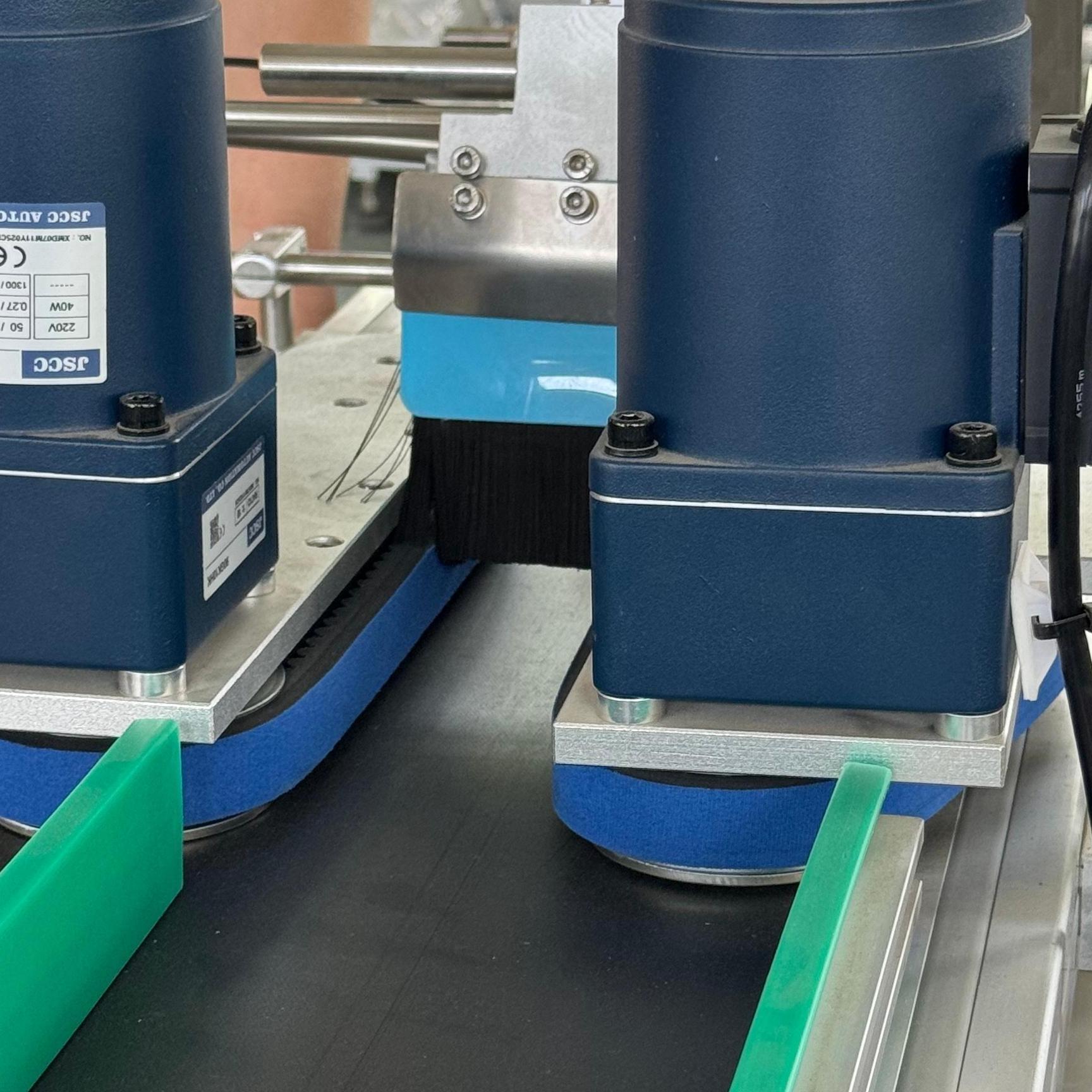 High Precision Automatic Garment Labeling Machine PLC Control With Stainless Steel Construction
