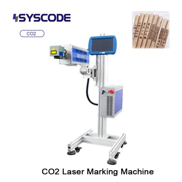 Automated CO2 Laser System - Production line integration. PLC compatible, 360° rotatable head for irregular products.