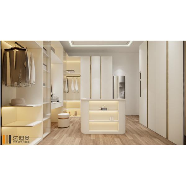 White Stainless Steel Walk-In Closet with Gold Accents & Vanity