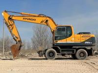 Excavateur à roues Hyundai 210-9 d'occasion 2014 en bon état à vendre à prix abordable