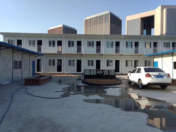 Multi-functional demountable Small Cheap Tiny Home Prefab House Cottages Container House Office Dormitory Manufacturer