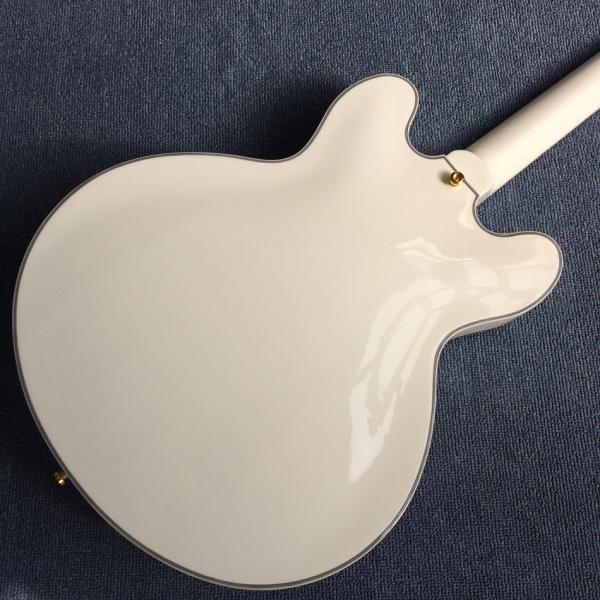 Hollow body jazz electric guitar, Double F holes,Ebony Fingerboard,Tremolo system,white guitar