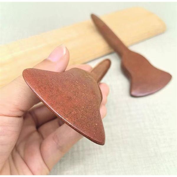 Experience the Healing Benefits of Full-body Massage and Acupoint Stimulation with Red Bian Stone Gua Sha Board
