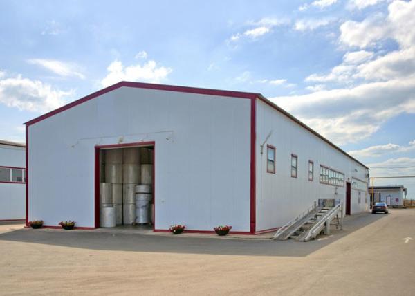 Topshaw Low Cost Prefabricated Light Steel Structure Steel Warehouse with Parapet Wall
