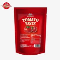 Un sac de 80 g contenant une pâte de tomate double concentrée avec des niveaux de pureté allant de 30% à 100%