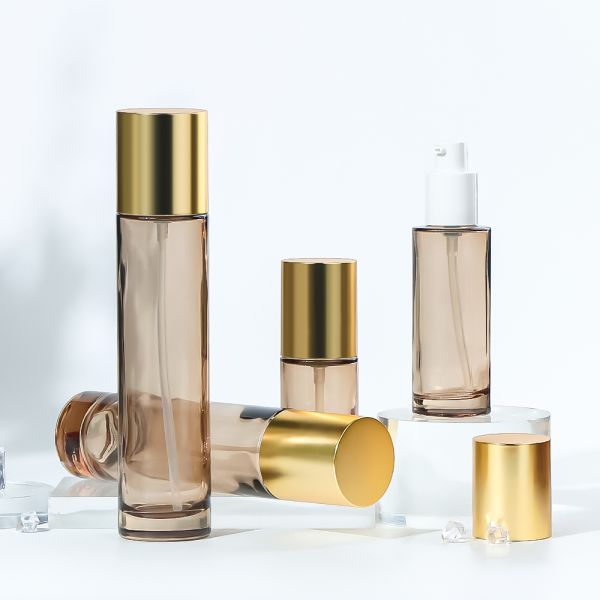 High-quality transparent glass cosmetic bottle with gradient paint and customized logo for lotion packaging