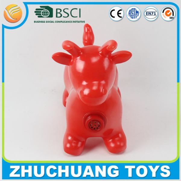 kids play small plastic toy bulls with music