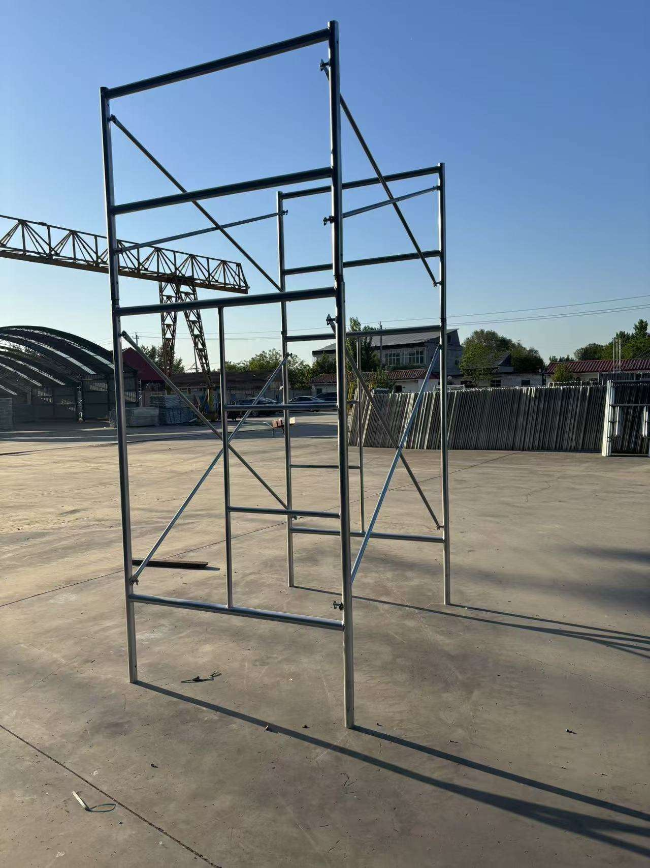 Hot-dip Galvanized Frame Scaffolding System with 10kN - 35kN Load Capacity and Adjustable Height Construction Platform