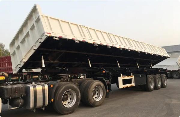 CIMC mechanical suspension Dual air brake system payload 70T allows goods to be unloaded from the side Tri-axle Tipper Trailer