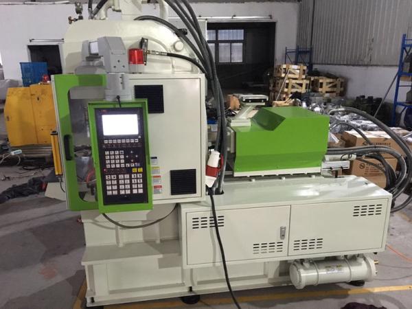 Máquina de moldeo por inyección de plástico estándar vertical para toma de corriente eléctrica