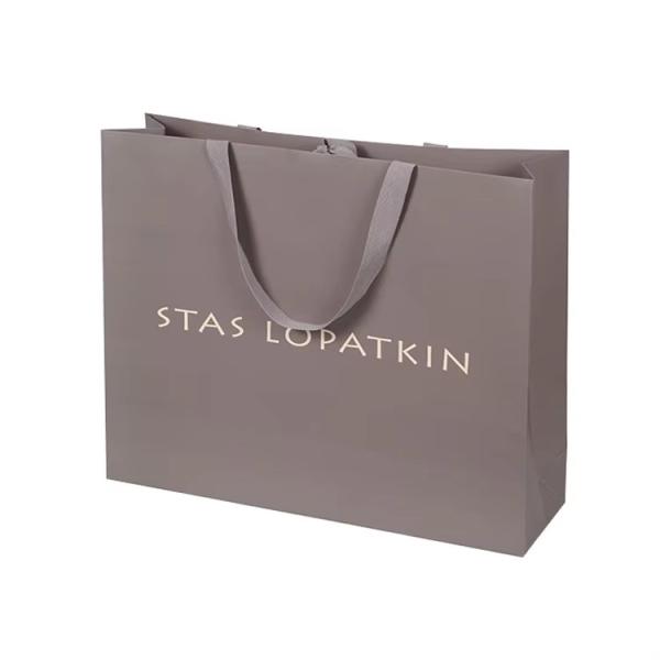 Embalagem de sacos de papel para roupas sapatos logotipo personalizado Impresso Sacos de papel de luxo