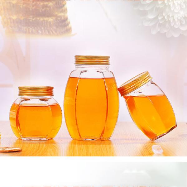 A barriga grande Honey Glass Jar 500ml seis tomou partido ISO9001 resistente ao calor