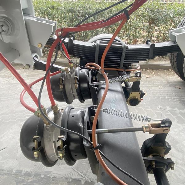 Truck Trailer 60Tons Side Dumper Semi Trailer with 28t Heavy Duty Landing Gear