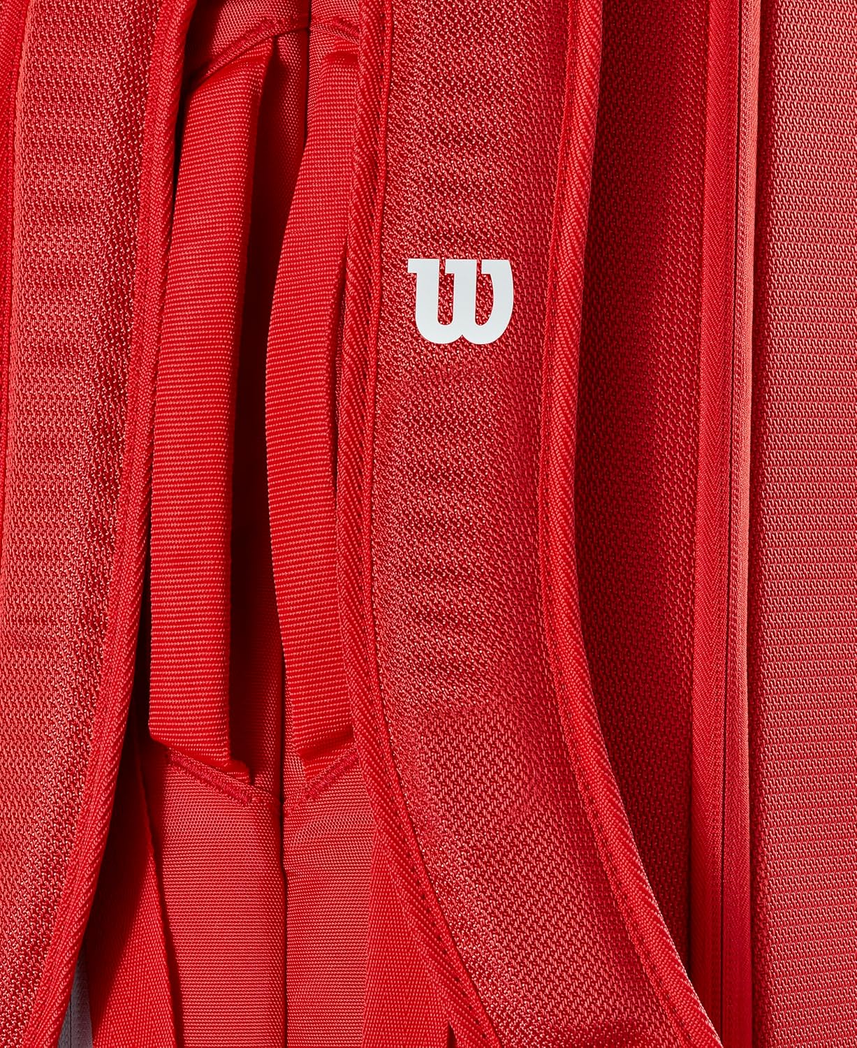 Wilson Super Tour Red Tennis Racket Backpack designed to hold up to 6 rackets with thermoguard lining and dual carrying system for comfortable transport