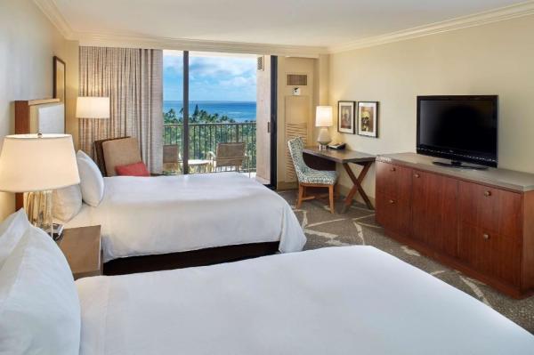 Sakiao interior designer for Hotel guestroom furniture by wood headboard beds with rattan armchairs and TV stand cabinet