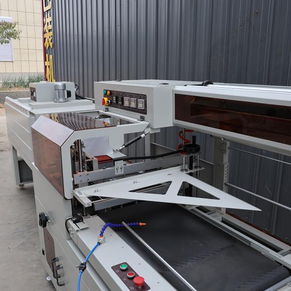 Pneumatic Heat Shrink Film Packaging Machine PLC Control High Speed Shrink Wrapper