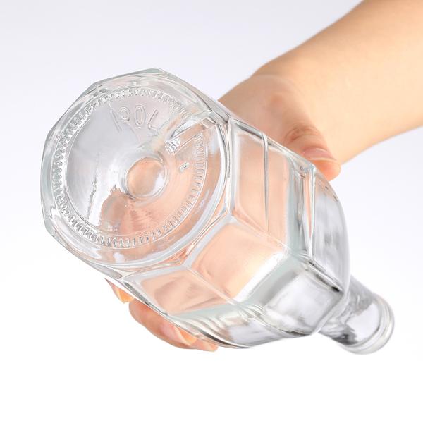 Diamantes octogonales Botella de jugo de vidrio Logotipo personalizado Bebida clara Estampado caliente Bienvenido