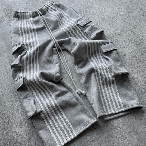 Pantalones de chándal con pierna ancha personalizada pantalones holgados rectos vintage para hombres múltiples bolsillos de chándal a rayas sólidas