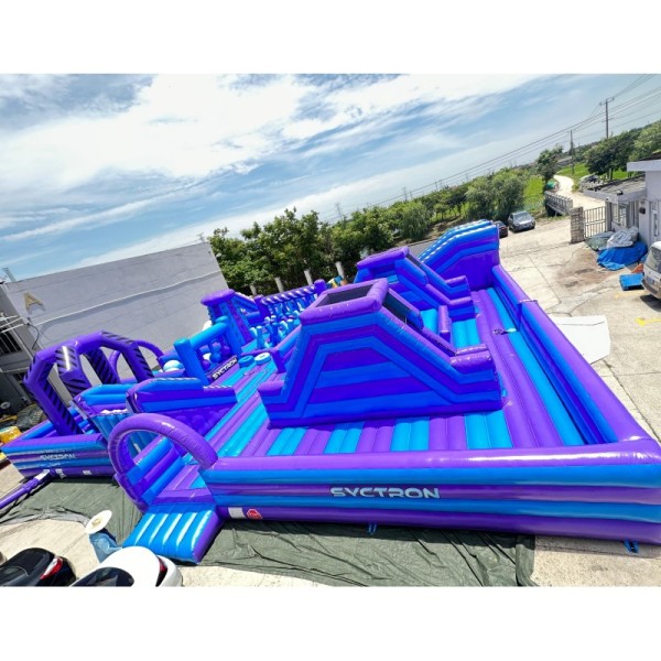 Purple Inflatable Ninja Obstacle Course with Climbing Challenges Balance Steps and Multiple Activity Zones