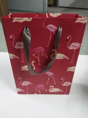 Eco Friendly Coloured Paper Carrier Bags Printed Goodie Bags With Ribbon Handle