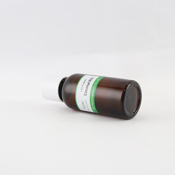 Huile parfumée jaune clair de lait de noix de coco Pour le shampooing et le lavage du corps Produits de soins capillaires