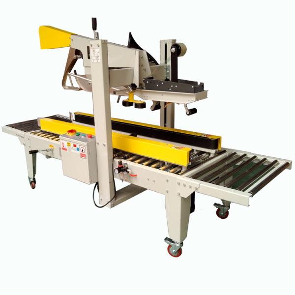 Drive hot melt glue carton sealing machine on both sides of the conveyor belt carton sealing machine