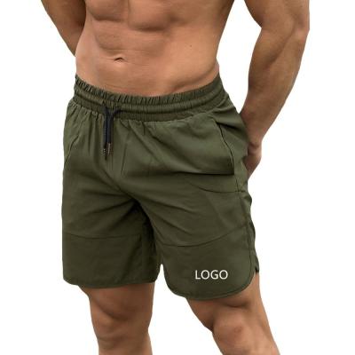Short do exercício do Spandex dos homens de 7 polegadas com bolsos Mesh Fitness Mens Gym Shorts