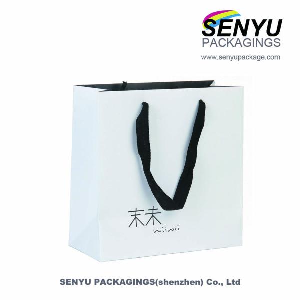 Sacs de papier de cadeau imprimés par coutume de luxe de Papier d'emballage gravant en refief ou stratification brillante