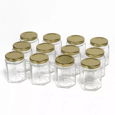 garrafas de vidro do armazenamento do hexágono do polígono 730ml gravadas para Chili Sauce Pickle