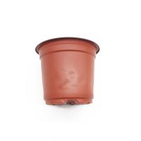 Les pots 17cm en plastique oranges noirs d'usine déchirent les planteurs vigoureux résistants de polypropylène