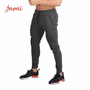 O músculo que treina o Activewear dos homens de Sweatpants assenta basculadores