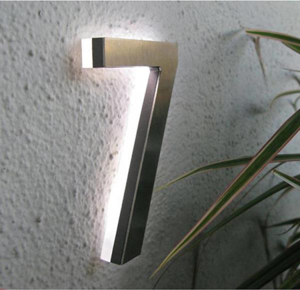 Iluminação de prata do halo dos números e das letras da porta da casa do metal da escova