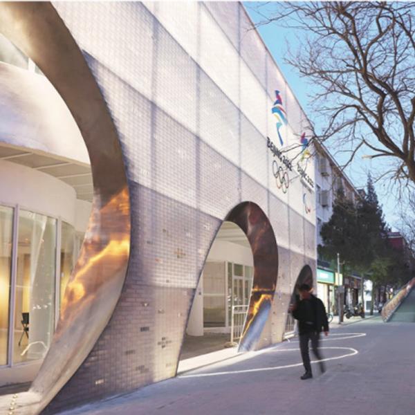 Design of Commercial Street Facades: Glass Block Curtains, a Wall by Day and an Urban Light Painting by Night