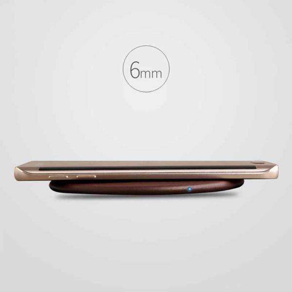 Ultra slim portable 5.5mm Qi wireless phone charger pad on table desk home for all mobiles