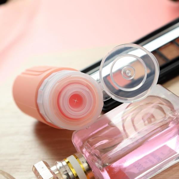 Bouteille de voyage en silicone essentiel rose 90 ml pour les articles de toilette