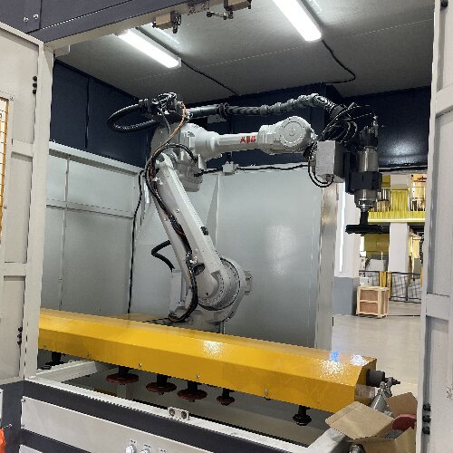 Automated Robotic Surface Finishing System With Parametric Process Calibration