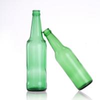 Bouteilles de bière en verre vert ambrée vides avec capuchon