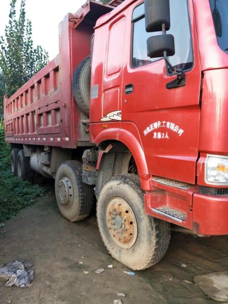 2015 Made Slightly Used Howo Dump Truck 8x4 Howo Tipper Truck Red Color