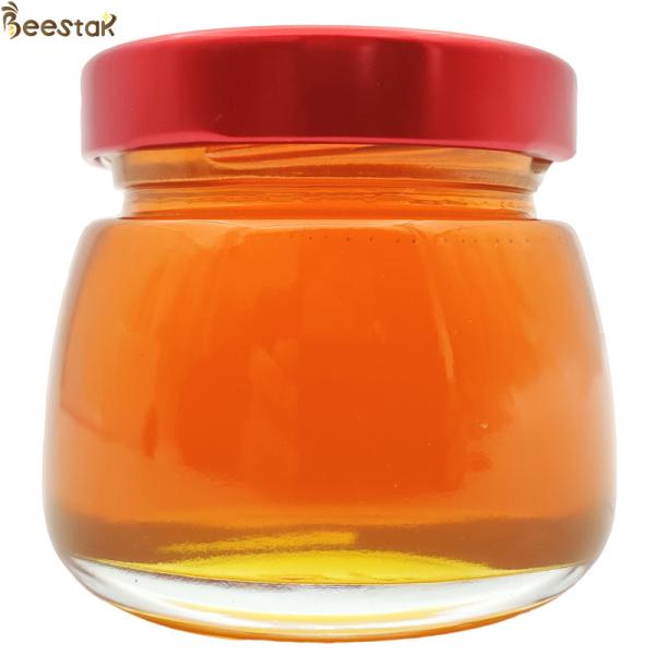 Venda a retalho 100% Mel de abelha natural de alta qualidade Mel de ervas tradicionais orgânicos crus puro