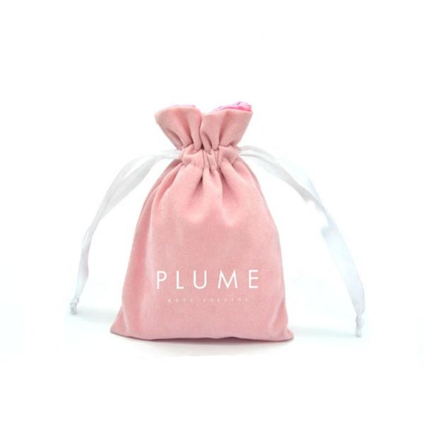 Soft Pink velvet drawstring bag with satin lining and customized white logo for lipstick packing