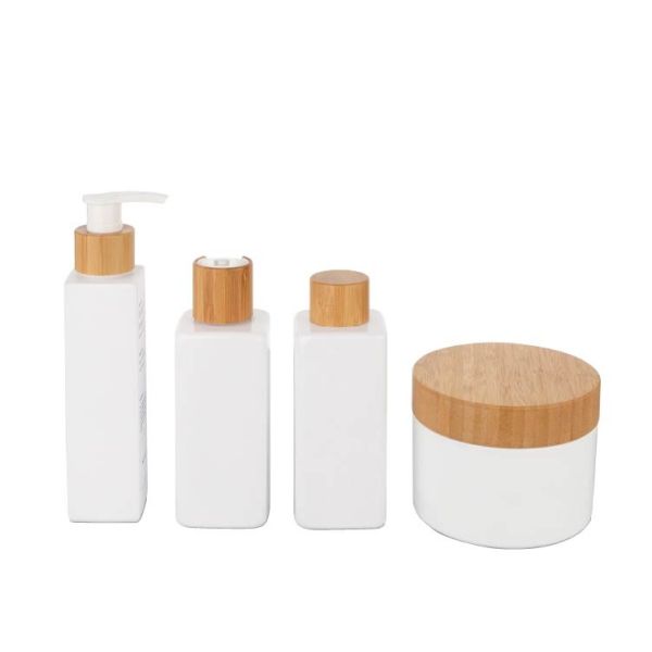 Bouteille cosmétique en bambou de 180 ml de lotion blanche avec bouchon en