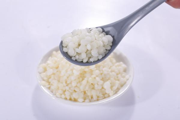 A cera de abelha branca pura de 100% granula a cera branca do grânulo para o alimento e a indústria cosmética