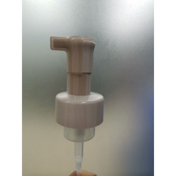 Pedido personalizado aceptado bomba de dispensador cosmético con modo de bloqueo de clip