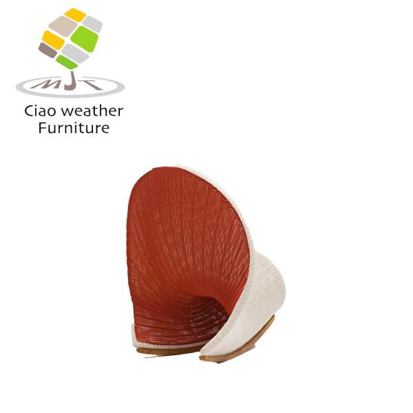 Experience Comfort and Style with this Modern Rattan Lounge Chair in Special Shell Shape