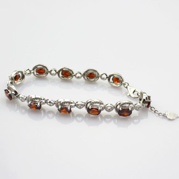 Sterling Silver 5x7mm Oval Garnet Cubic Zircon Tennis Bracelet(B06RED)