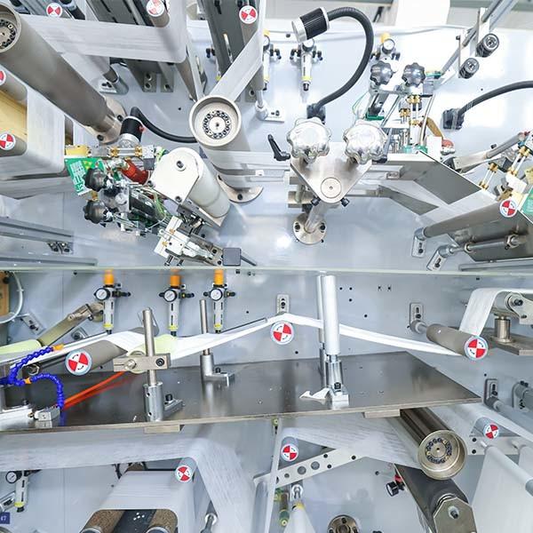 Womeng Intelligent Equipment Full Servo Sanitary Napkin Production Line with CE