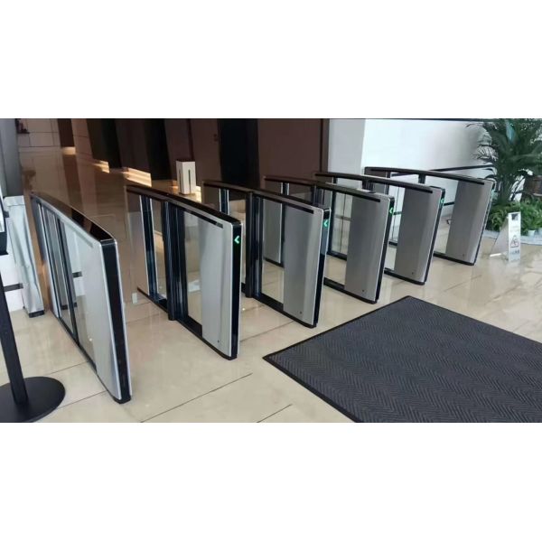 Swing Barrier Turnstile featuring automatic arm open on power off and delayed close for emergency and operational safety