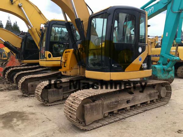 O tipo original da esteira rolante usou a máquina escavadora de Caterpillar, máquina escavadora do meio do gato 313D